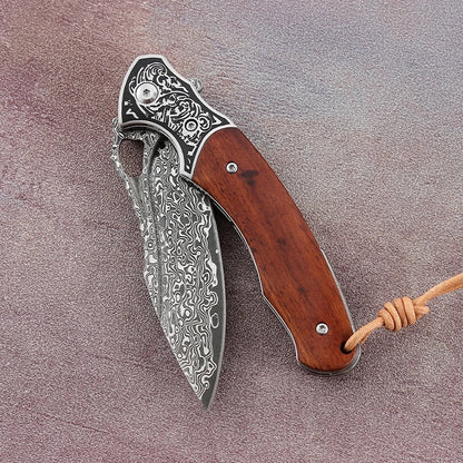 Meteor Engraved Damascus Steel Pocket Knife with Exotic Red Sandal Wood Handle